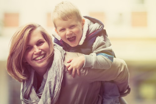 Happy mother and child smiling